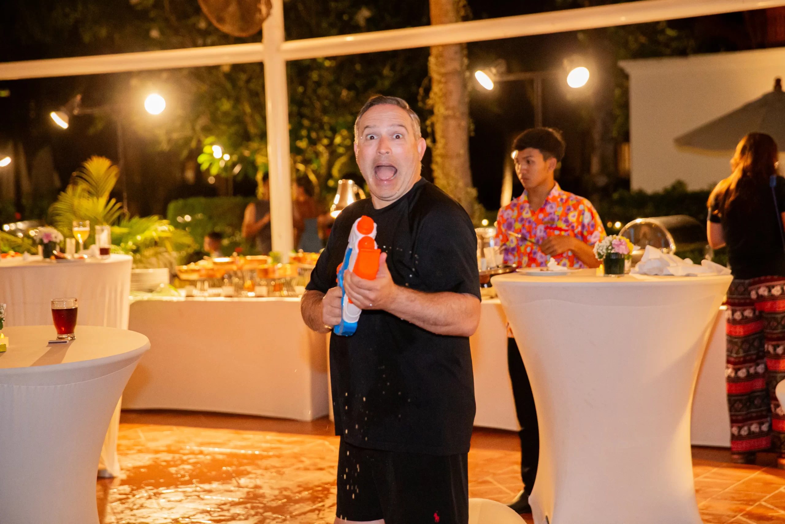 man-having-fun-with-watergun