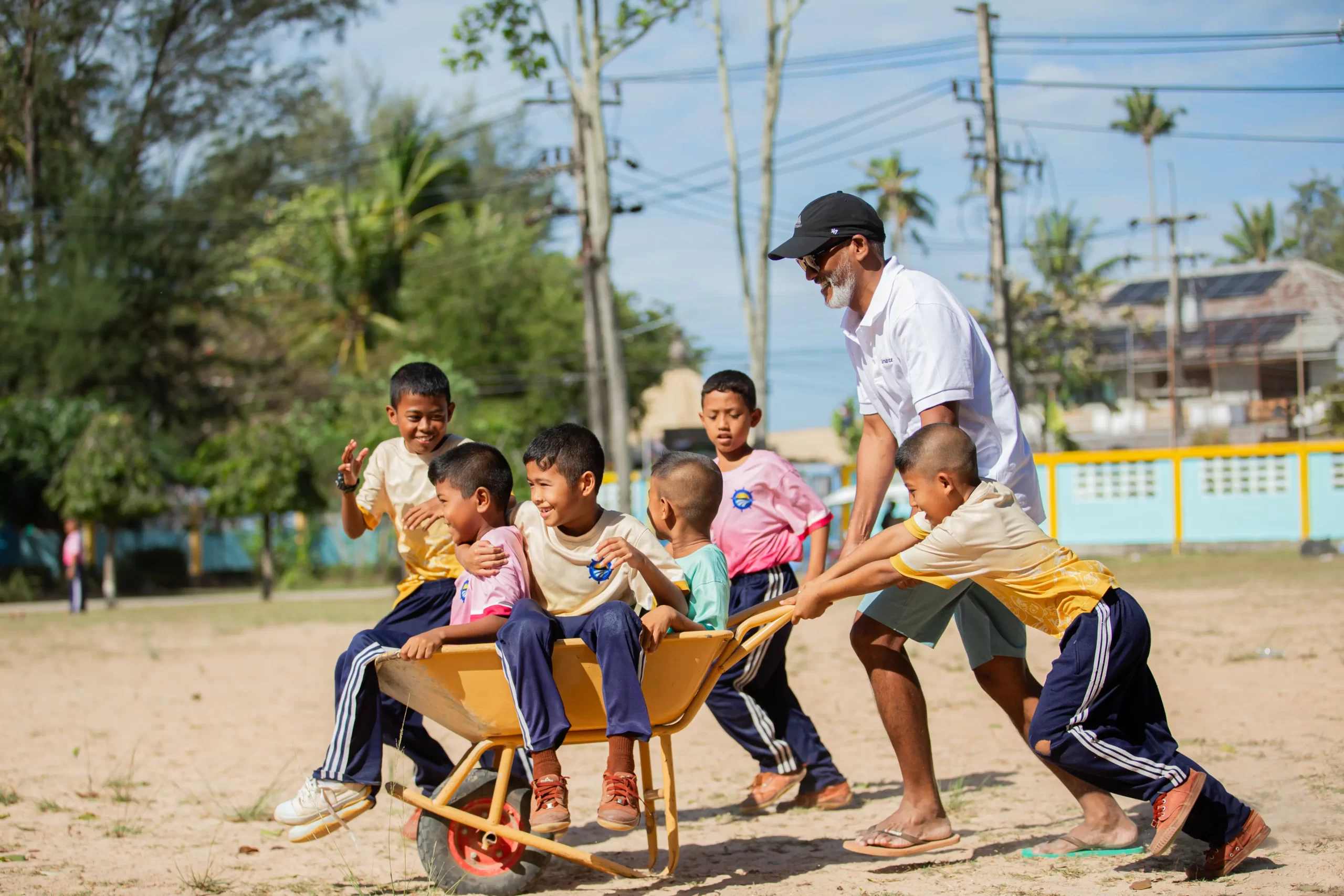 man-playing-with-children