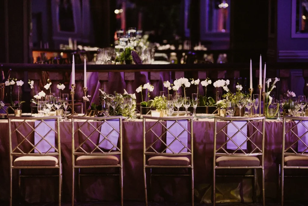 Elegantly styled long banquet table by a professional event organizer